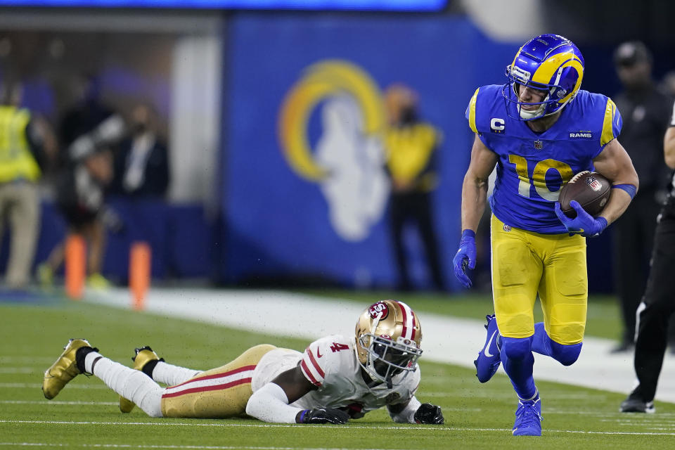 Los Angeles Rams' Cooper Kupp (10) gets past San Francisco 49ers' Emmanuel Moseley during the second half of the NFC Championship NFL football game Sunday, Jan. 30, 2022, in Inglewood, Calif. (AP Photo/Marcio Jose Sanchez)