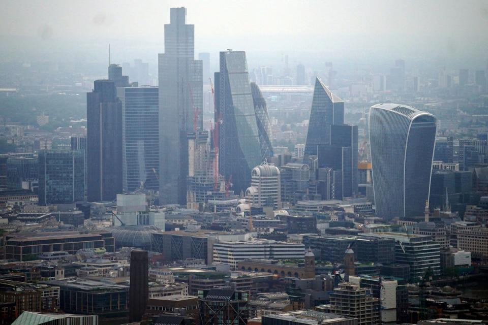 An aerial view of the City of London skyline, including the Leadenhall building, the Gherkin, 20 Fenchurch Street, 22 Bishopsgate and The Scalpel. Picture date: Friday July 9, 2021. (PA Archive)