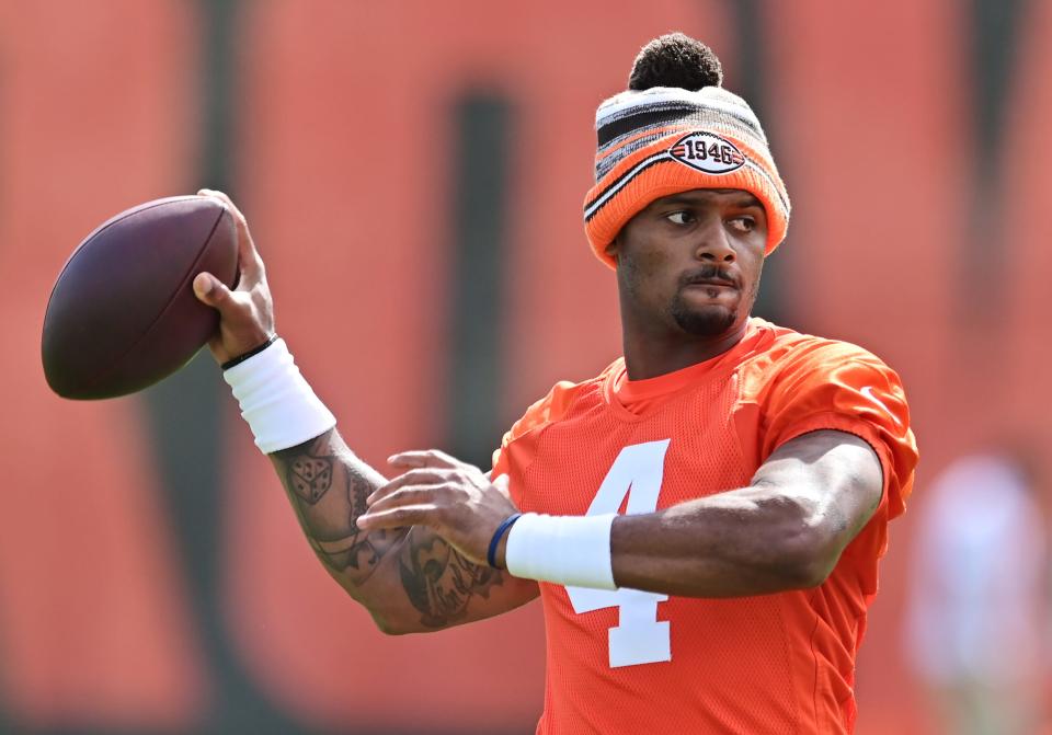 Browns quarterback Deshaun Watson throws a pass during organized team activities in Berea, May 25, 2022.