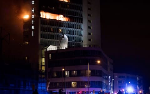 Flames engulf several floors at the Metro Hotel - Credit:  Eamonn Farrell