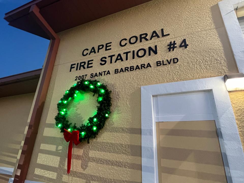 Cape Coral Firefighters put up a wreath with green bulbs in celebrations as the Department holds its “Keep the Wreath Green” fire safety campaign annually between Dec 1 to Jan. 1.