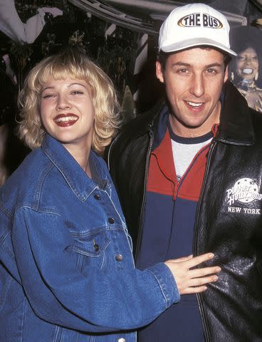 <p>Ron Galella, Ltd./Ron Galella Collection via Getty</p> A young Adam Sandler and Drew Barrymore