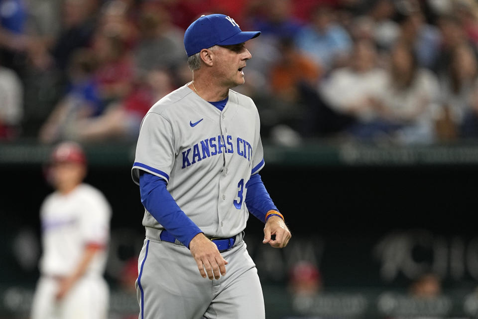 Kansas City Royals manager Matt Quatraro wals back to the dugout after making a pitching change in the sixth inning of a baseball game against the Texas Rangers, April 10, 2023, in Arlington, Texas. (AP Photo/Tony Gutierrez)