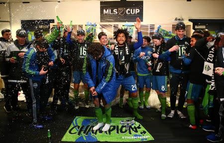 Dec 10, 2016; Toronto, Canada; The Seattle Sounders celebrates in the locker room after beating Toronto FC in the 2016 MLS Cup at BMO Field. Mandatory Credit: Mark J. Rebilas-USA TODAY Sports