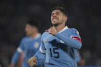 Uruguay's Facundo Valverde celebrates scoring his side's second goal against Chile during a qualifying soccer match for the FIFA World Cup 2026 at Centenario stadium in Montevideo, Uruguay, Friday Sept. 8, 2023.(AP Photo/Matilde Campodonico)