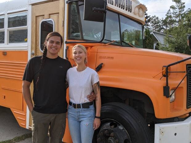 Karlen Janiver, left, and Shanny Kirby, right, left Saskatoon on Saturday to begin their travels in a bus they spent the last nine months renovating to be a home on wheels.  (Dayne Patterson/CBC News - image credit)