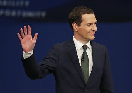 Britain's Chancellor of the Exchequer George Osborne waves after delivering his keynote speech at the annual Conservative Party Conference in Manchester, Britain October 5, 2015. REUTERS/Phil Noble