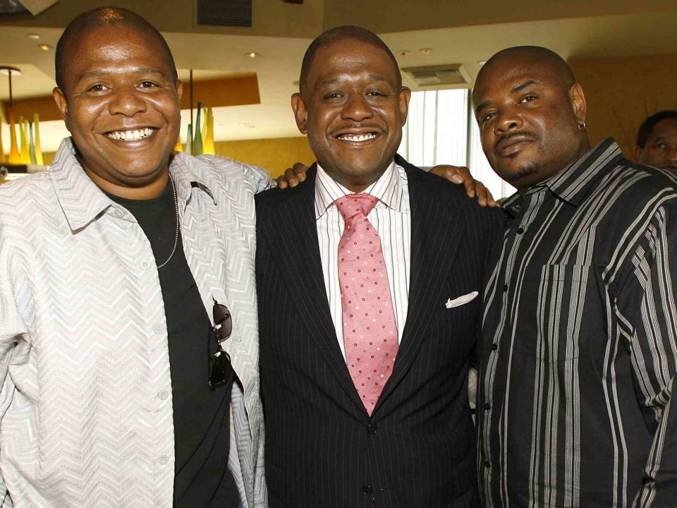 <p>Chris Polk/FilmMagic</p> Forest Whitaker with his brothers, Kenn and Damon Whitaker 