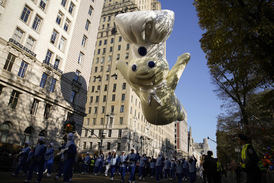 The Pillsbury Doughboy floats down Central Park Avenue West during the Macy's Thanksgiving Day Parade, Thursday, Nov. 24, 2022, in New York. (AP Photo/Julia Nikhinson)