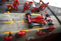 Ferrari driver Sebastian Vettel of Germany drives out of the pits after changing tyres during the second practice session prior to the Formula One Grand Prix at the Barcelona Catalunya racetrack in Montmelo, Spain, Friday, Aug. 14, 2020. (AP Photo, Emilio Morenatti, Pool)