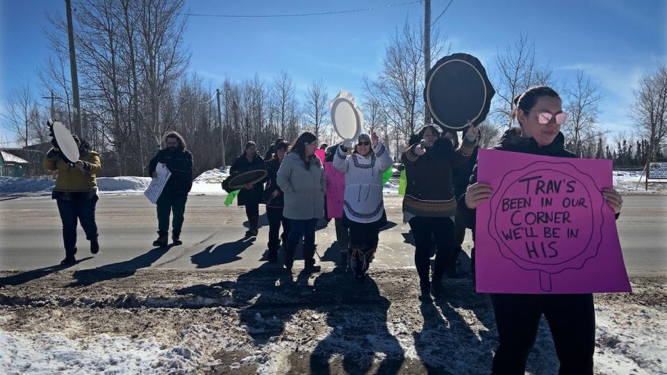 Residents of Happy Valley-Goose Bay protested outside the town hall Thursday to support Travis Ford. Ford is the town's former recreation director, who says he was fired without cause or reason on Wednesday. (Rhivu Rashid/CBC - image credit)