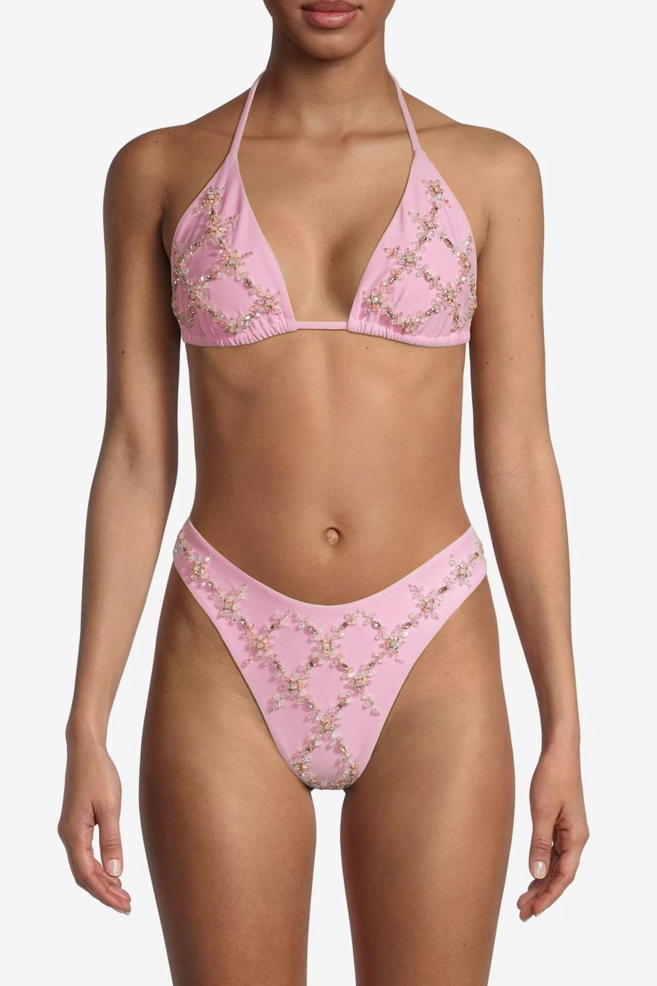 <p><a href="https://go.skimresources.com?id=74968X1525074&xs=1&url=https%3A%2F%2Fwww.saksfifthavenue.com%2Fproduct%2FOceanus-Rose-Hand-Embroidered-Bikini-0400020443178.html" rel="noopener" target="_blank" data-ylk="slk:Shop Now;elm:context_link;itc:0;sec:content-canvas" class="link ">Shop Now</a></p><p>Rose Hand swimsuit</p><p>saksfithavenue.com</p><p>$250.00</p>