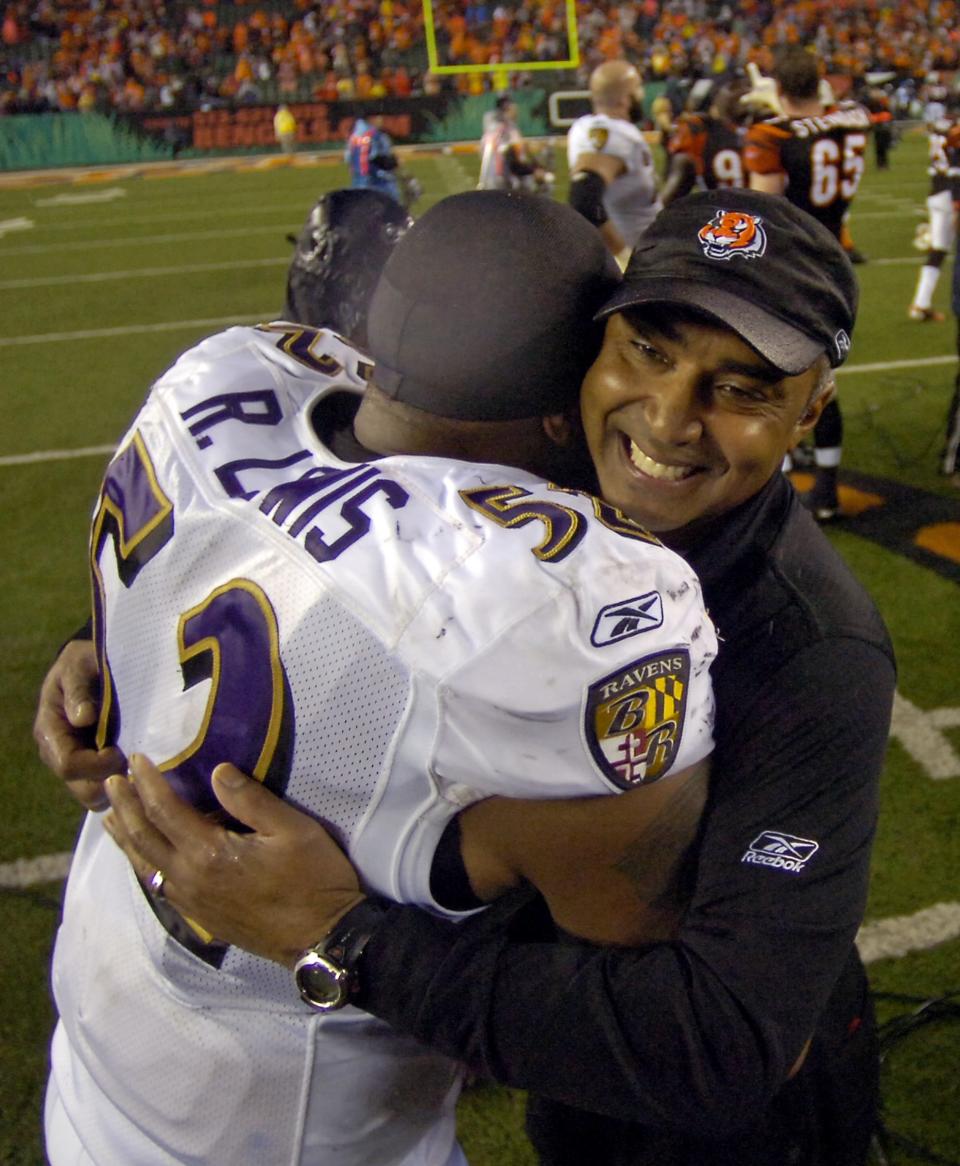 Cincinnati Bengals head coach Marvin Lewis gives a big hug to Baltimore Ravens linebacker Ray Lewis after the Bengals 13-7 win at Paul Brown Stadium Thursday November 30, 2006. Marvin Lewis coached Ray Lewis while he was the defensive coordinator of the Ravens, when his linebackers coach was Jim Schwartz.