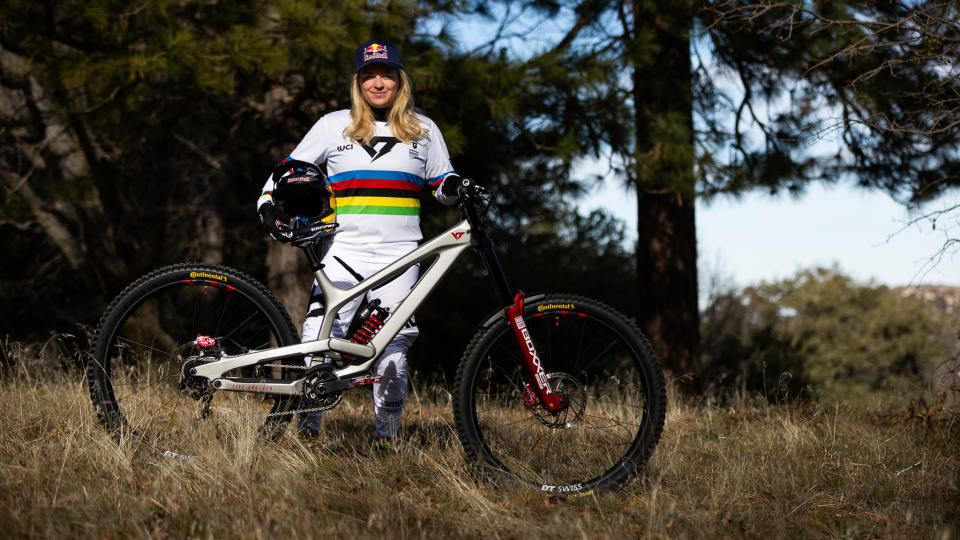  Vali Höll in the rainbow jersey with the YT Tues DH bike. 