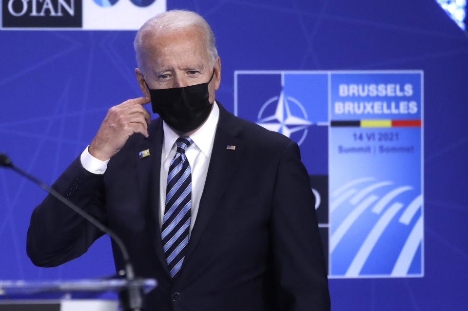 U.S. President Joe Biden arrives for a media conference during a NATO summit in Brussels, Monday, June 14, 2021. U.S. President Joe Biden is taking part in his first NATO summit, where the 30-nation alliance hopes to reaffirm its unity and discuss increasingly tense relations with China and Russia, as the organization pulls its troops out after 18 years in Afghanistan. (Olivier Hoslet, Pool via AP)