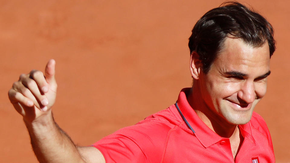 Seen here, Roger Federer gives a thumbs up after his first round win at Roland Garros. 