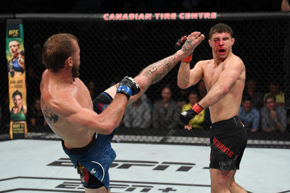 OTTAWA, ON - MAY 04:  (L-R) Donald Cerrone kicks Al Iaquinta in their lightweight bout during the UFC Fight Night event at Canadian Tire Centre on May 4, 2019 in Ottawa, Ontario, Canada. (Photo by Jeff Bottari/Zuffa LLC/Zuffa LLC via Getty Images)