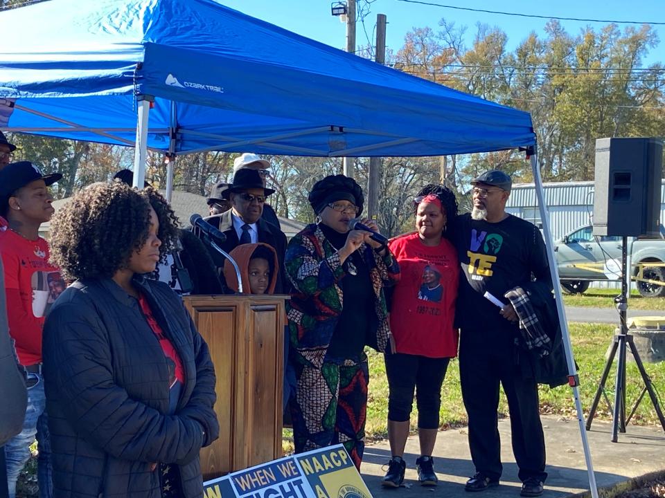 Monica Fabre, spokesperson for the family of the late Jerome Stevenson, speaks while standing to the right of Stevenson's 6-year-old son, Jerome Christopher. The elder Stevenson died on Nov. 6, two days after he allegedly was beaten while an inmate at the Avoyelles Parish Jail.