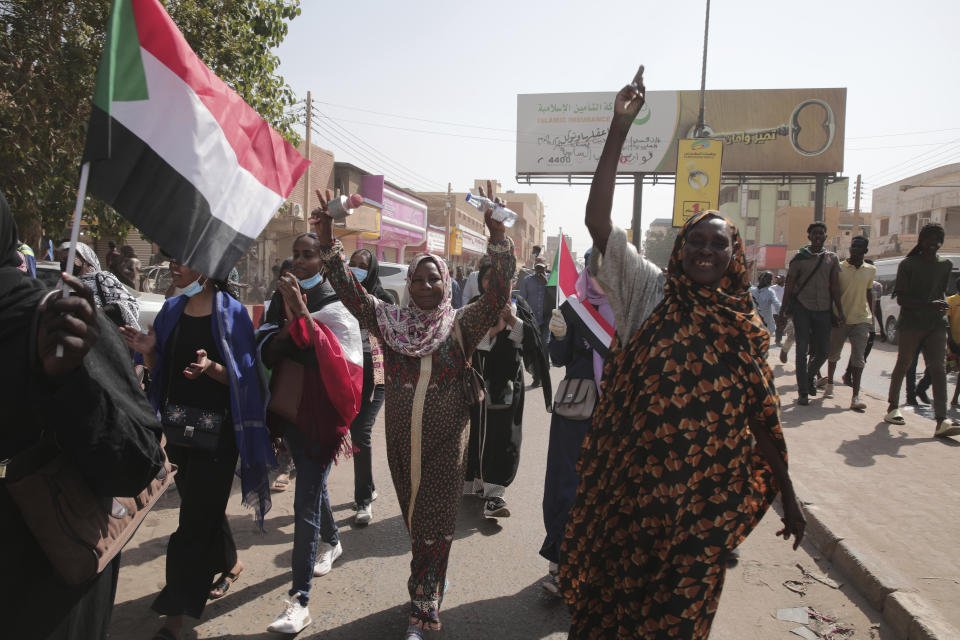 People gather during a protest in Khartoum, Sudan, Thursday, Jan. 13, 2022. Thousands of people took to the streets on Thursday against a coup that has plunged the country into grinding deadlock. (AP Photo/Marwan Ali)