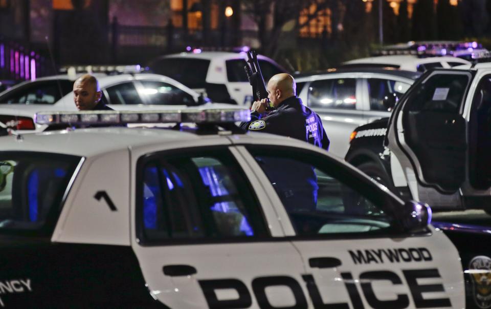 Police secure the area after reports that a gunman fired shots at the Garden State Plaza mall in Paramus, New Jersey, November 4, 2013. A person with a gun opened fire on Monday evening in the New Jersey shopping mall shortly before closing time in the town of Paramus, and the mall was being evacuated, a county official said. (REUTERS/Ray Stubblebine)