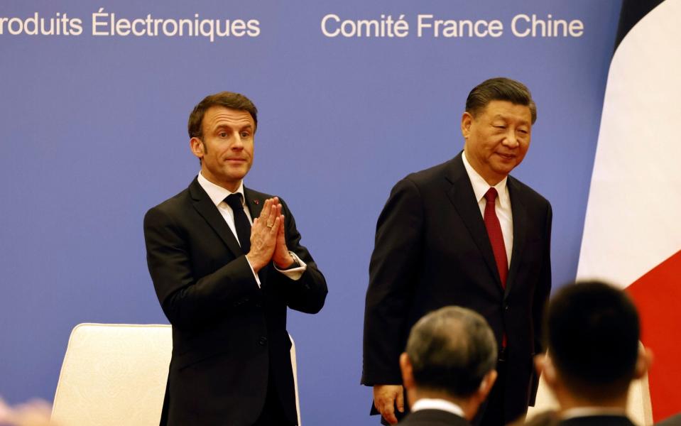 French President Emmanuel Macron, left, and Chinese President Xi Jinping - Ludovic Marin/Pool via AP