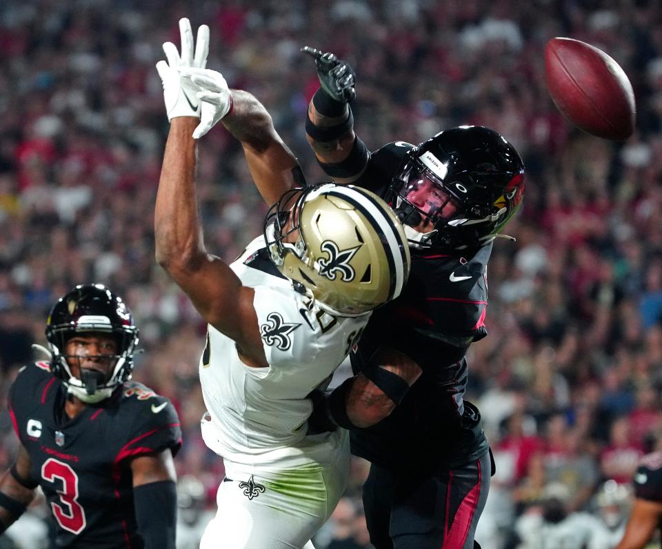 October 20, 2022; Glendale, Ariz; USA; Cardinals Byron Murphy (7) breaks up a pass intended for Saints Tre’Wuan Smith (10) during a game at State Farm Stadium.