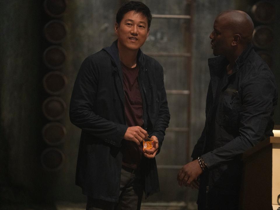 The long-awaited return of fan favourite, formerly dead Han (Sung Kang) hands him an impressive welcome and almost nothing to do afterwards (Universal Pictures)