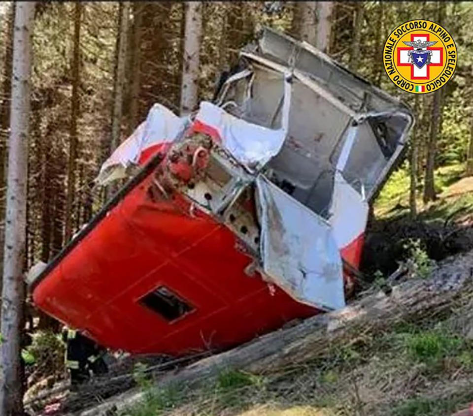 A crashed cable car is seen after it collapsed in Stresa, near Lake Maggiore, Italy.