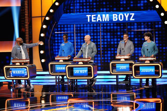 <p>Christopher Willard/ABC/Getty</p> Wanya Morris, Shawn Stockman, Jo Koy, Joe Mulvihill, and Joseph Herbert Jr. on 'Celebrity Family Feud'.