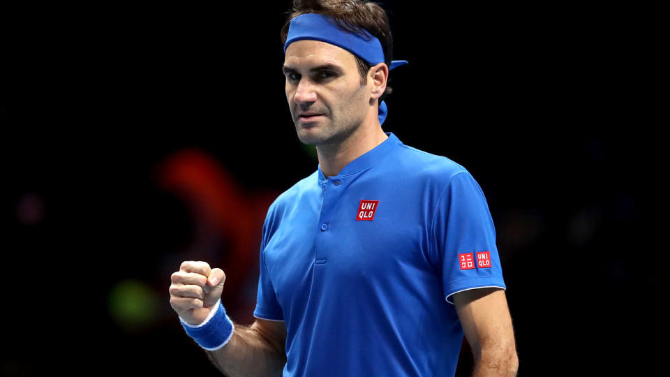 Roger Federer celebrates winning his singles match. (Photo by Adam Davy/PA Images via Getty Images)