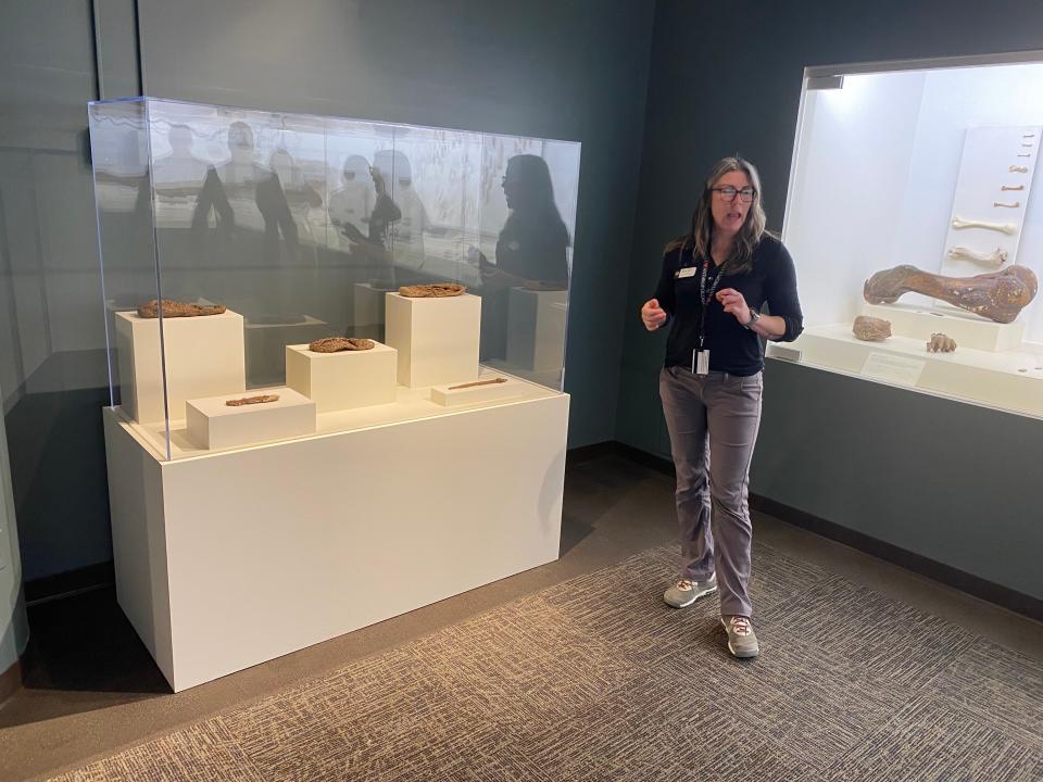 Jessica Boldt, curator of collections in the MU Museum of Anthropology, discusses ancient shoes found in a Missouri cave. The Missouri or Anthropology and the Museum of Art and Archaeology are reopening in the lower level of Ellis Library.