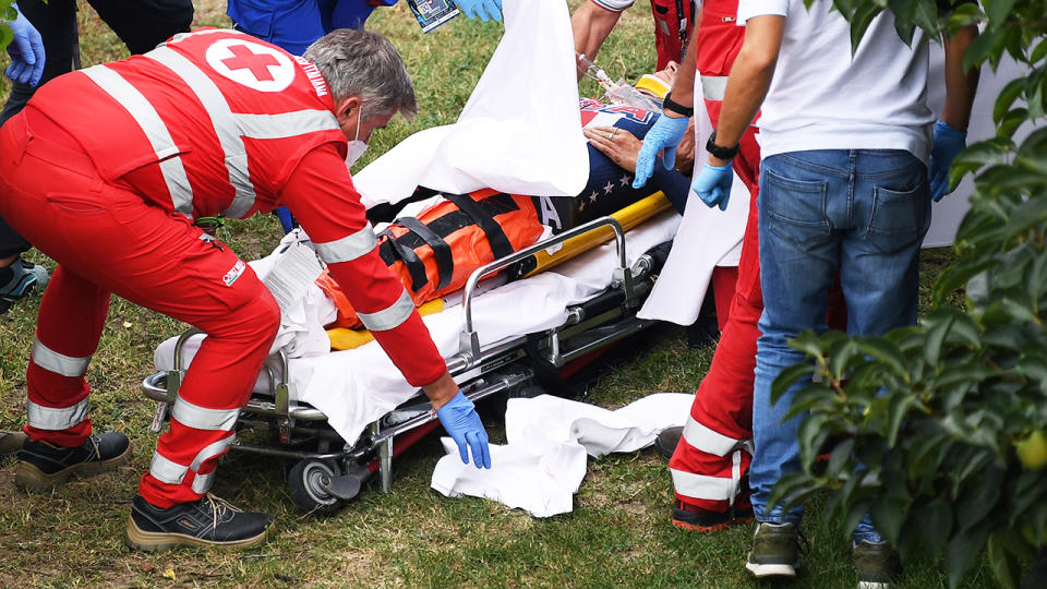 Chloe Dygert, pictured here being treated by medics after her crash. 