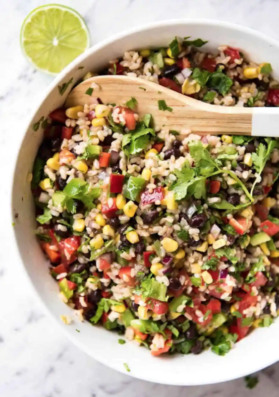 <p>RecipeTin Eats</p><p>Based on the famous Cowboy Caviar, this brown rice salad is filled with bright, zesty flavors, plenty of juicy veggies, nutty brown rice and drizzled with a fabulous Southwestern lime dressing!</p><p><strong>Get the recipe: <a href="https://www.recipetineats.com/cowboy-rice-salad/" rel="nofollow noopener" target="_blank" data-ylk="slk:Cowboy Rice Salad;elm:context_link;itc:0;sec:content-canvas" class="link ">Cowboy Rice Salad</a></strong></p>