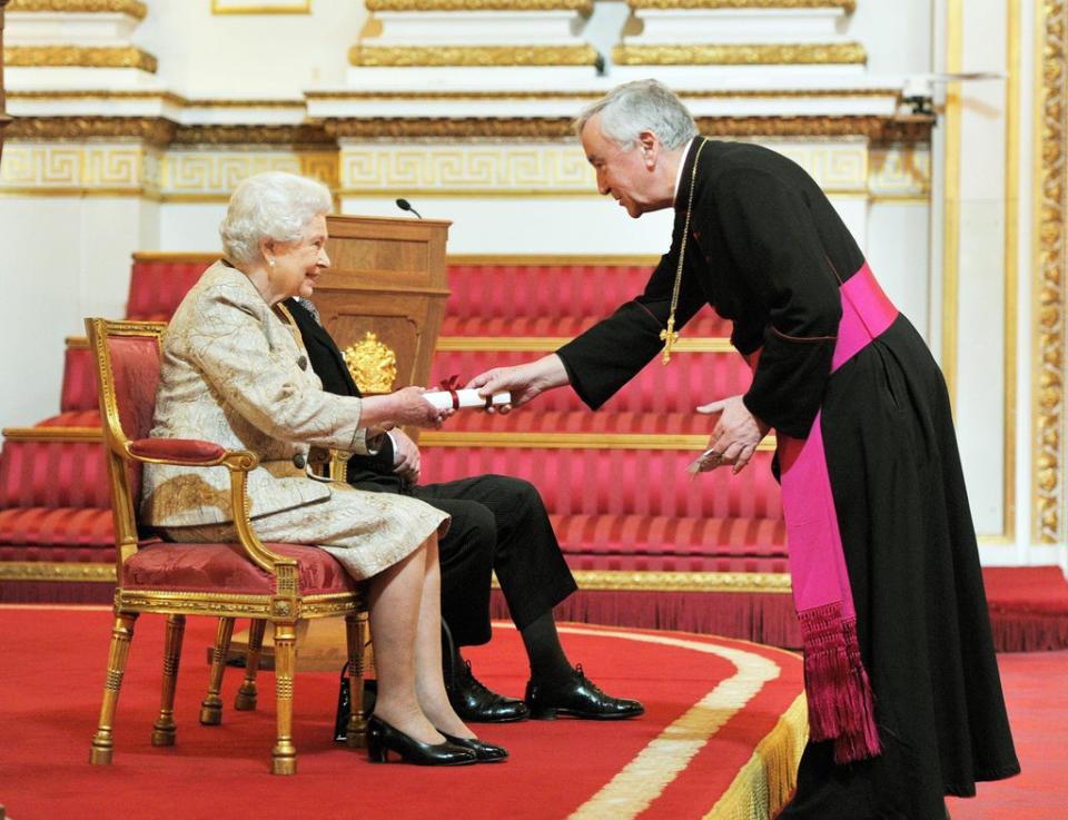 Archbishop Vincent Nichols with the Queen and the Duke of Edinburgh  (PA)