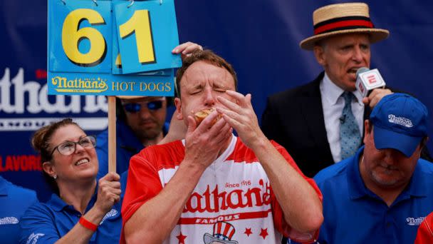 PHOTO: World Champion Joey Chestnut competes in the 2023 Nathan's Famous Fourth of July International Hot Dog Eating Contest at Coney Island in New York City, July 4, 2023. (Amr Alfiky/Reuters)