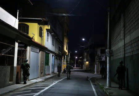 Army soldiers patrol the streets of Vila Velha, Espirito Santo, Brazil February 9, 2017. REUTERS/Paulo Whitaker