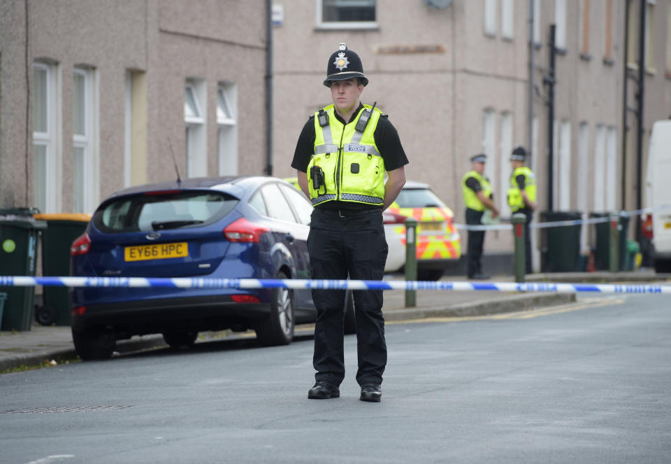 Police at the scene in Jeffrey Street in Newport, A 48-year-old man and a 30-year-old man have been arrested in connection with the Parsons Green terror attack. (Picture: PA)