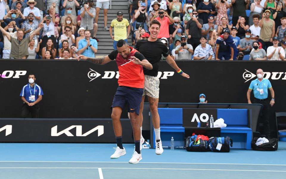 JANUARY 23: Thanasi Kokkinakis (R) of Australia and Nick Kyrgios of Australia celebrate match point in their third round doubles match against Ariel Behar of Uruguay and Gonzalo Escobar of Ecuador during day seven of the 2022 Australian Open at Melbourne Park on January 23, 2022 in Melbourne, Australia - GETTY IMAGES