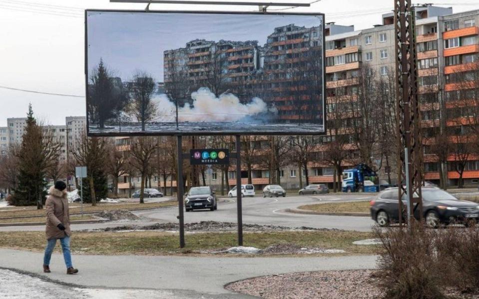A billboard forecasts the destruction that a Russian invasion could wreak