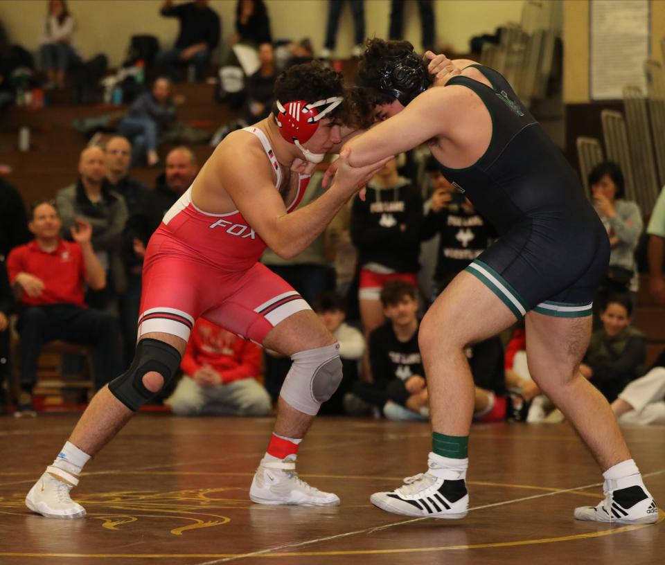 Alexander Berisha from Fox Lane on his way to defeating Rocco Lore from Yorktown in the 215 pound match during the wrestling divisional at Clarkstown South High School in West Nyack, Feb. 3, 2024.
