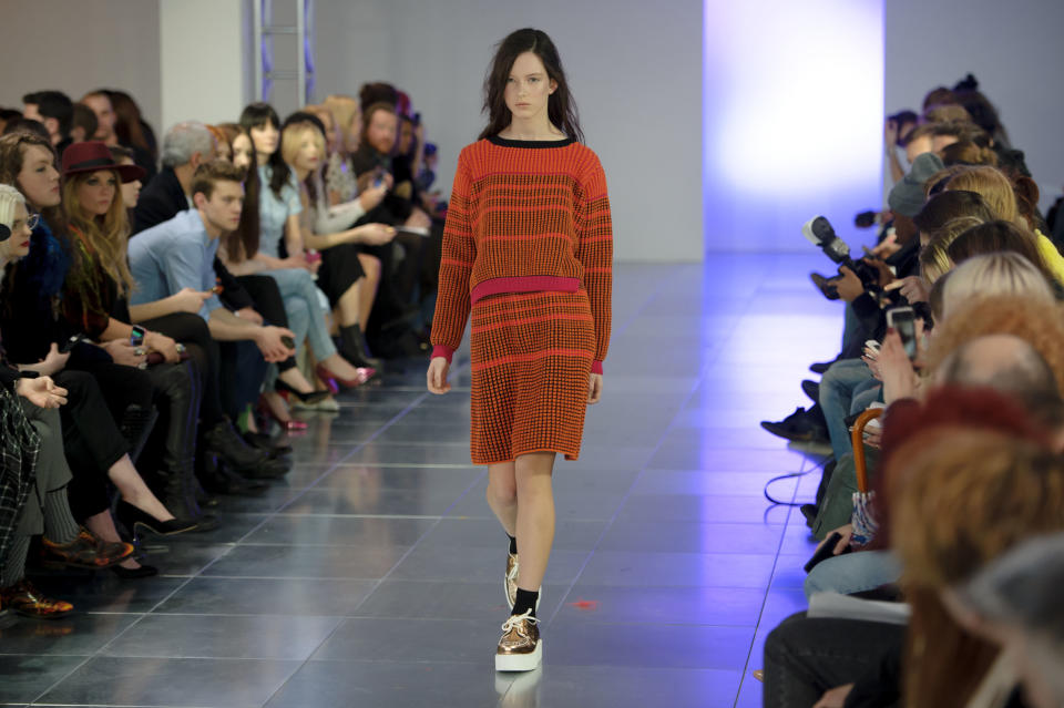 A model wears a design created by Mark Fast during London Fashion Week Autumn/Winter 2014, at Somerset House in central London, Friday, Feb. 14, 2014. (Photo by Jonathan Short/Invision/AP)