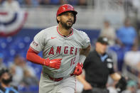 Los Angeles Angels' Aaron Hicks (12) watches his hit to right field for a home run during the fourth inning of a baseball game against the Miami Marlins, Tuesday, April 2, 2024, in Miami. (AP Photo/Marta Lavandier)