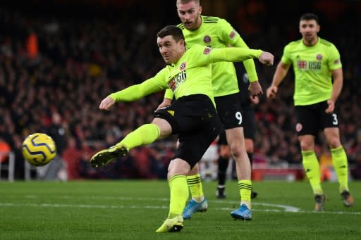 John Fleck's sweet strike secured Sheffield United a 1-1 draw at Arsenal