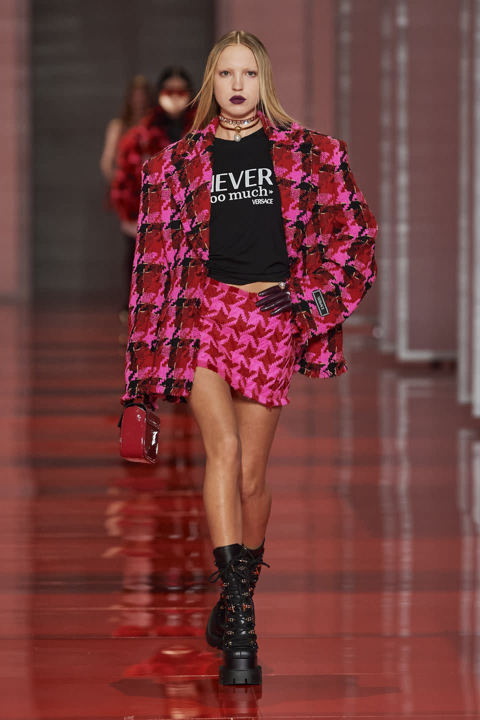 Lila Moss walks for Versace at Milan Fashion Week AW22