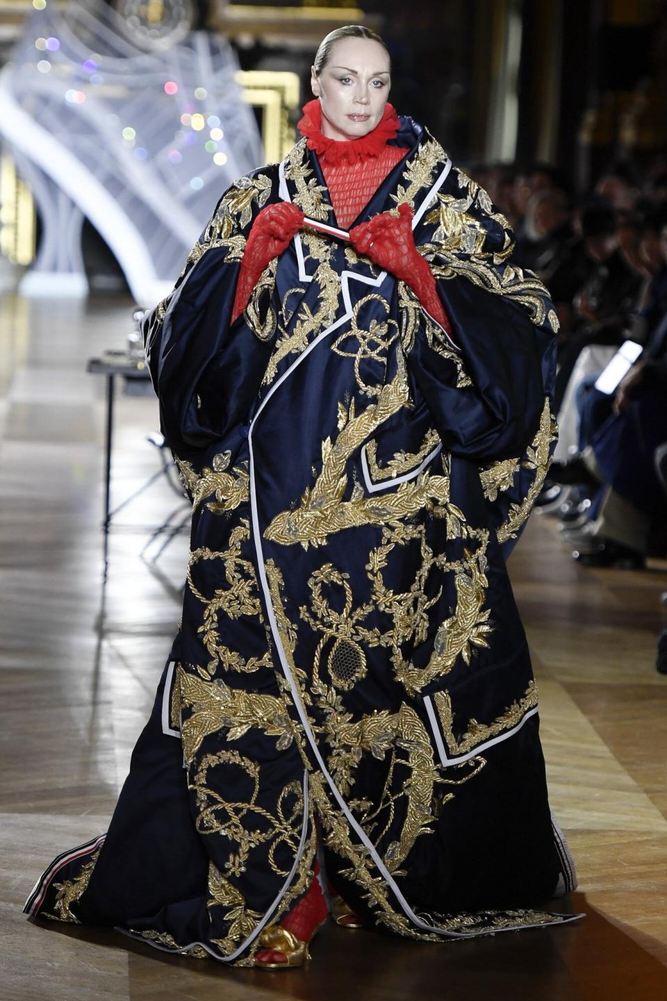 Gwendoline Christie walks the runway during the Thom Browne Ready to Wear Spring/Summer 2023 fashion show as part of the Paris Fashion Week on October 3, 2022 in Paris, France