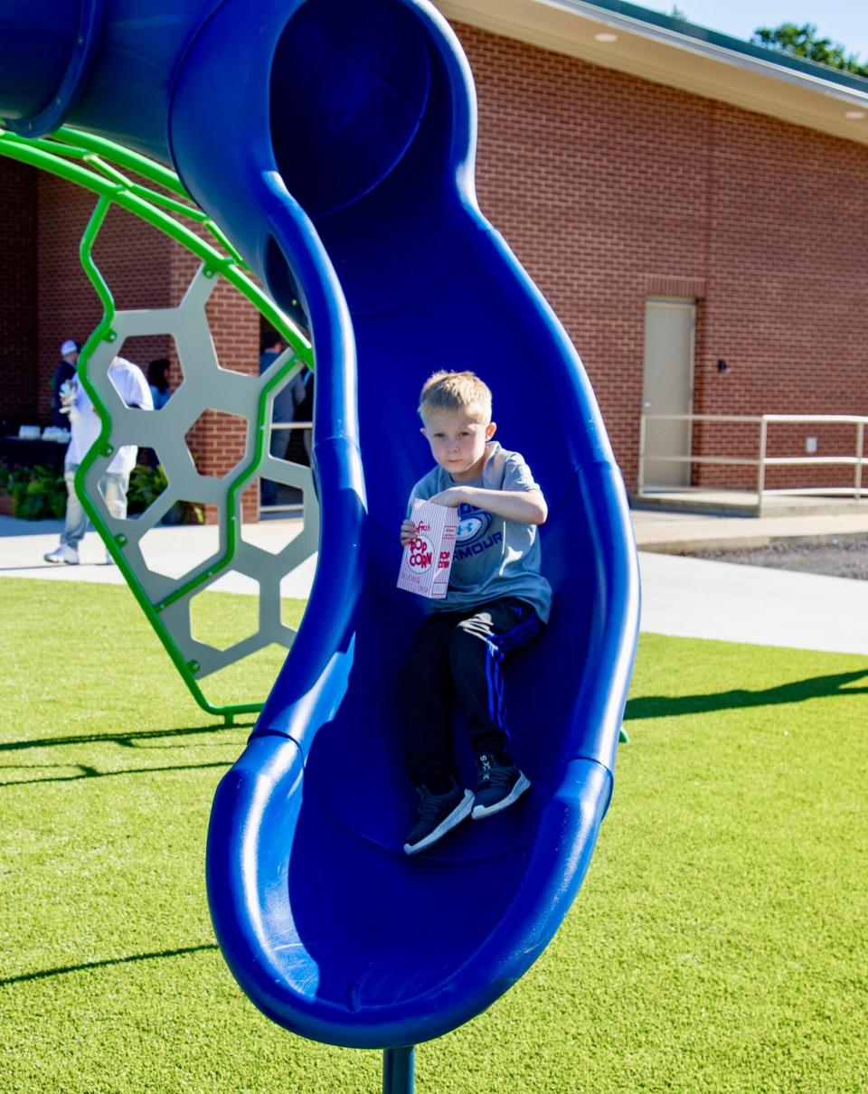 Children got to try out the playground at Champions Field at the Gadsden Sports Complex following the ribbon cutting on Monday, April 22, 2024.