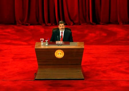 FILE PHOTO: Egypt's new President Mohamed Mursi is pictured before his speech at Cairo University