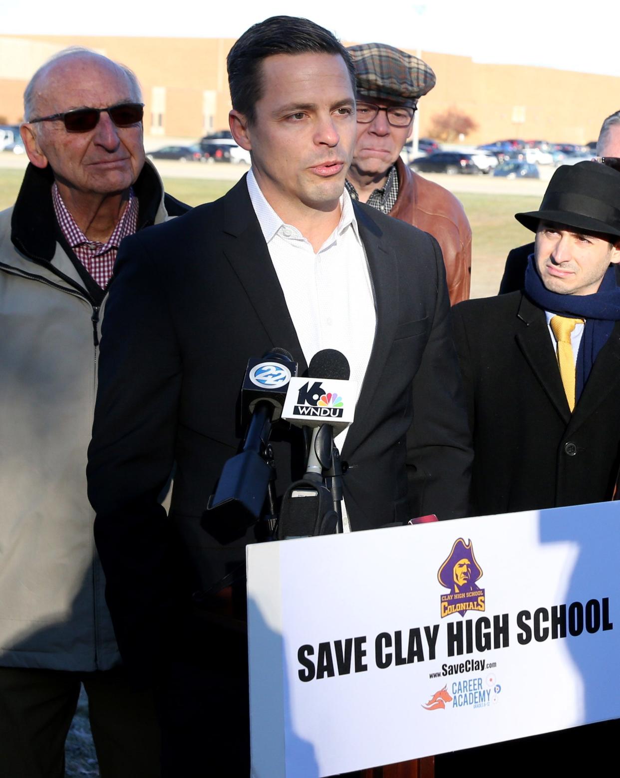 Career Academy charter network Superintendent Jeremy Lugbill speaks Wednesday, Dec. 13, 2023, in front of Clay High School about the announcement that Carer Academy officials are seeking to lease-purchase Clay High School and make it a charter school.