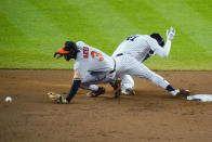 New York Yankees' Miguel Andujar (41) steals second base as Baltimore Orioles' Jorge Mateo (3) tries to catch the throw during the fourth inning of a baseball game Wednesday, May 25, 2022, in New York. Gleyber Torres scored on a throwing error by Adley Rutschman on the play. (AP Photo/Frank Franklin II)