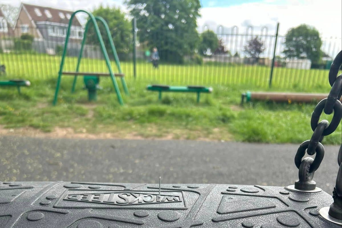 A nail sticks out of the swings that a young girl was about to be lowered on to  (Supplied)